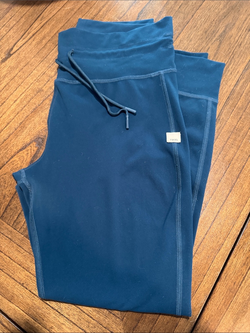 Vuori Women's Leggings in Deep Teal Blue